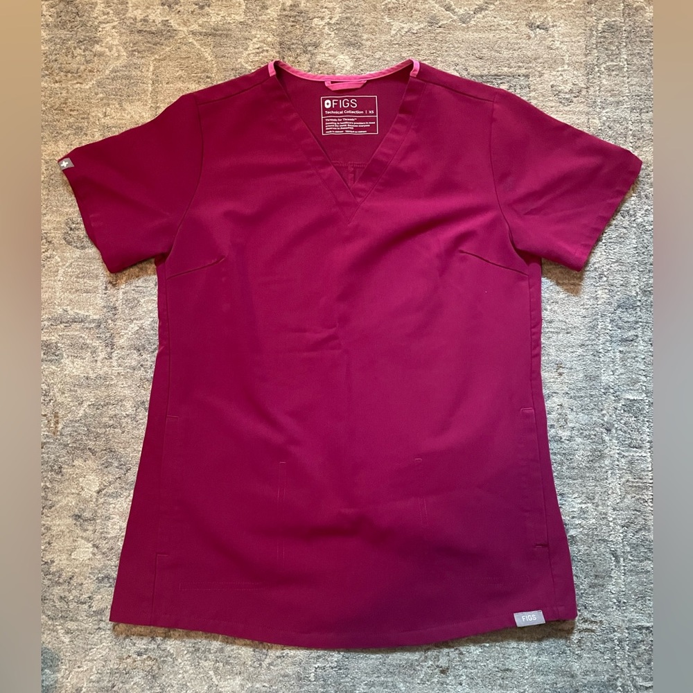 FIGS XS fuschia two-pocket scrub top